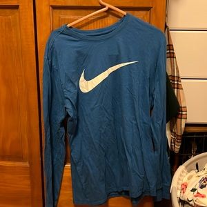 Blue Nike shirt